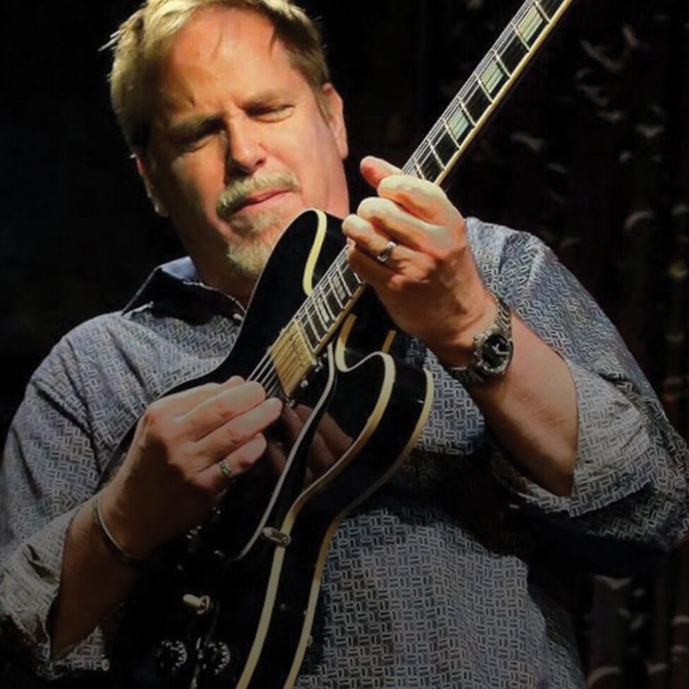 Dave Stryker playing guitar.